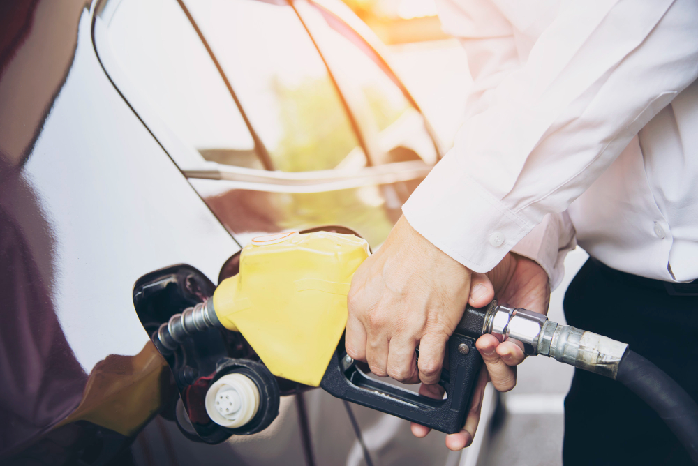https://www.freepik.com/free-photo/man-putting-gasoline-fuel-into-his-car-pump-gas-station_5192676.htm#query=man-putting-gasoline-fuel-into-his-car-in-a-pump-gas-station&position=2&from_view=search&track=sph